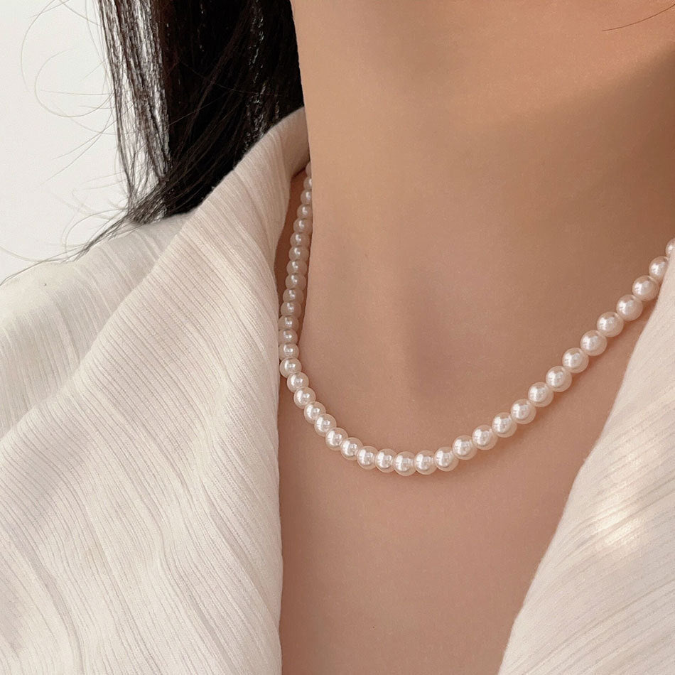 Delicate Shell Pearl Necklace